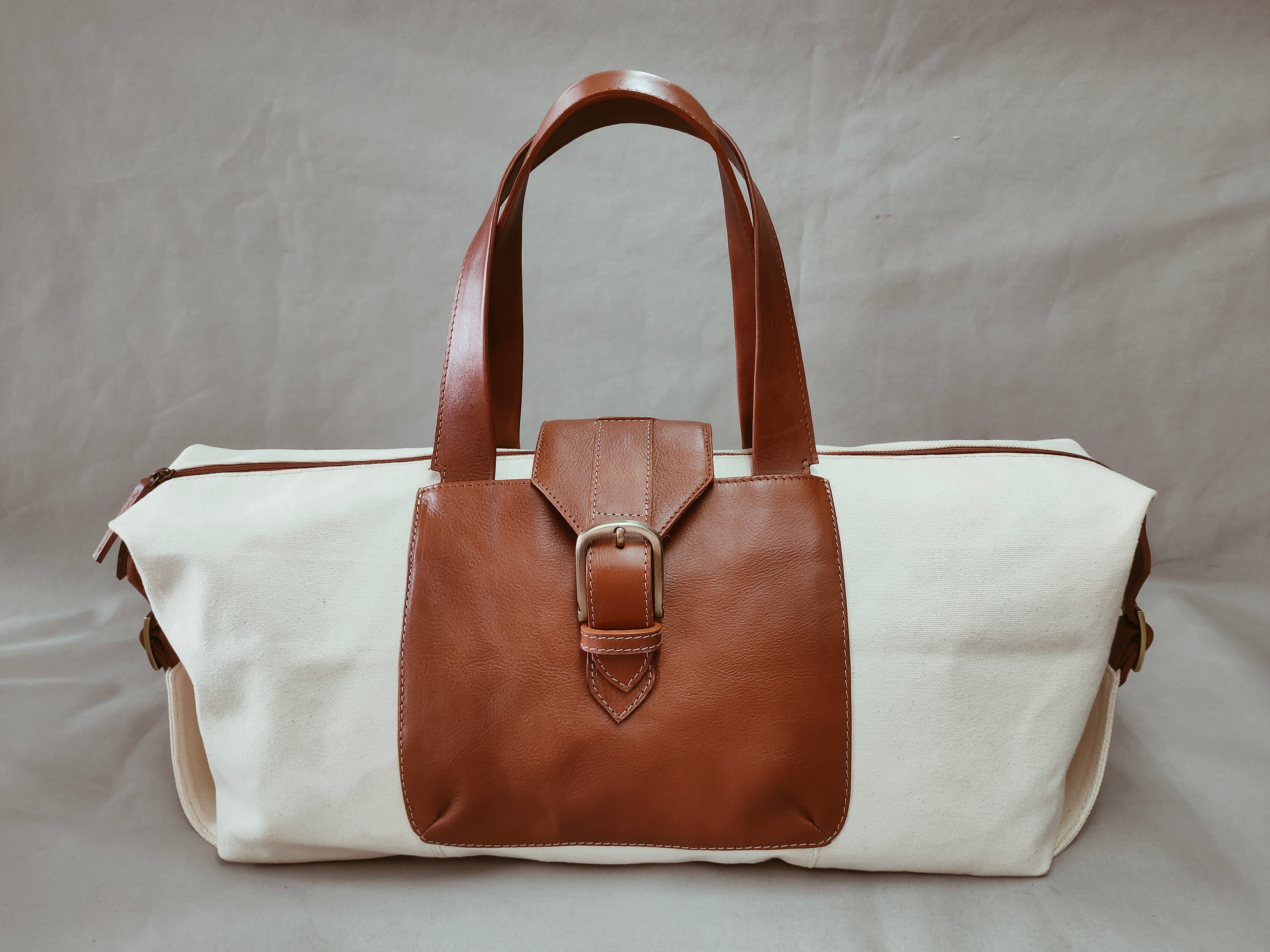 Salvatore duffel bag  white canvas and veg tan