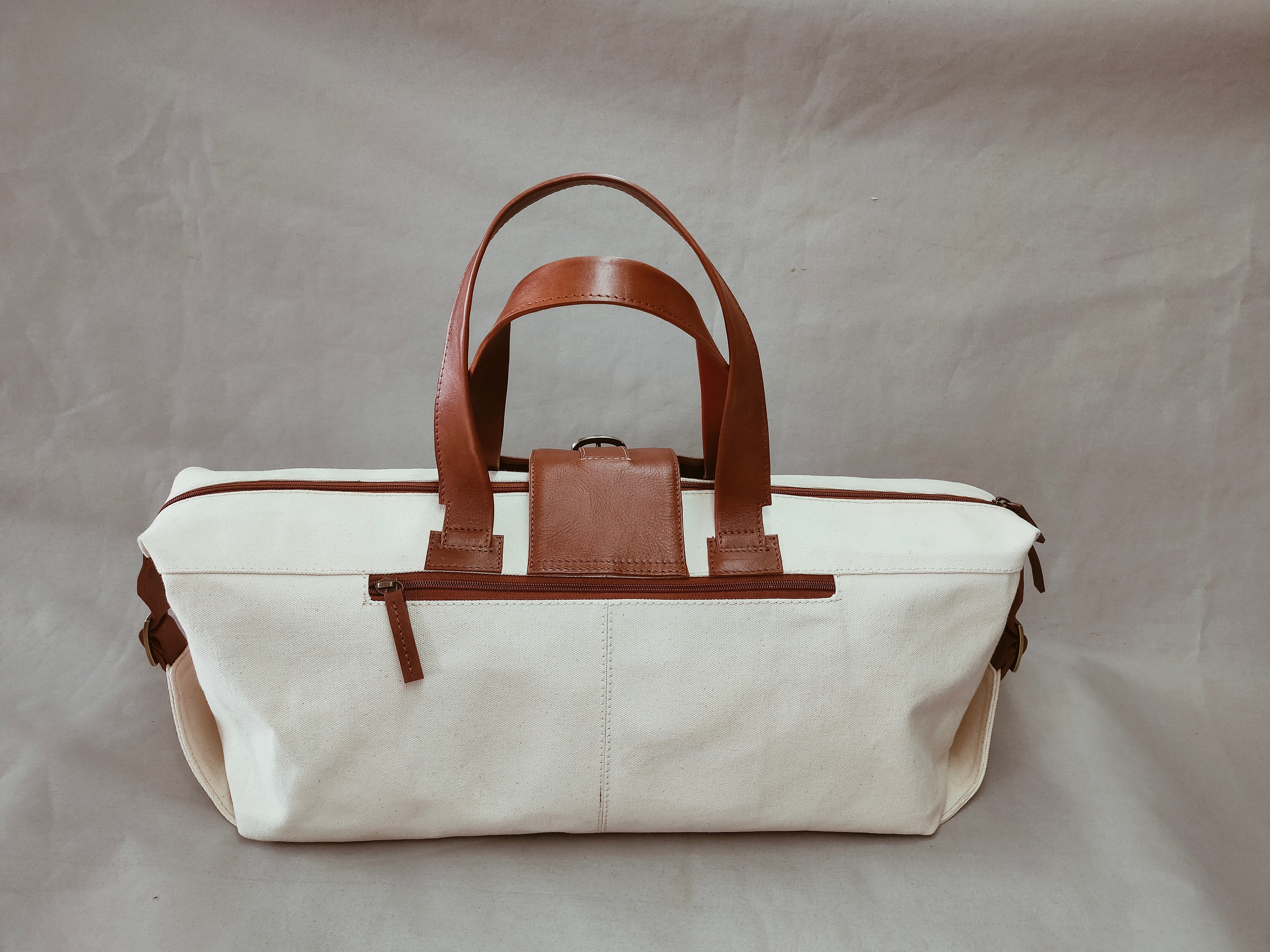 Salvatore duffel bag  white canvas and veg tan